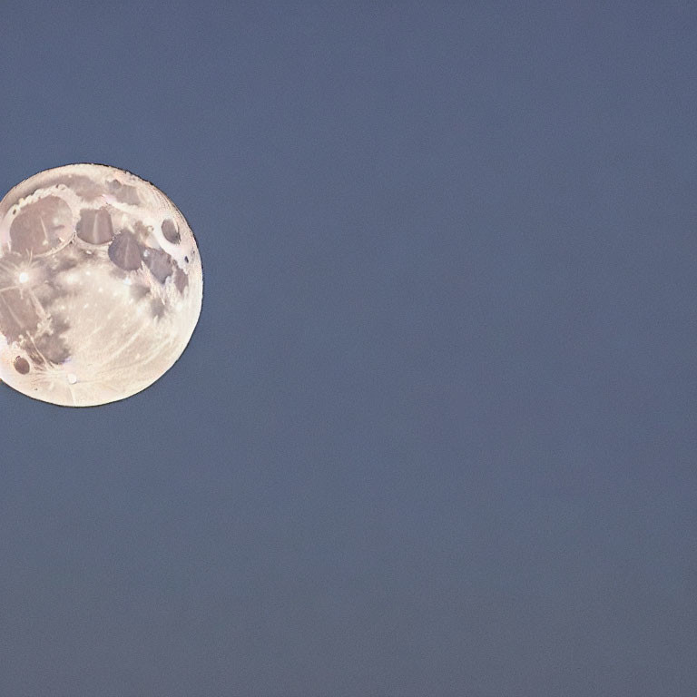 Detailed Image: Full Moon with Craters in Twilight Sky