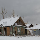 Traditional Stone Cottages Covered in Thick Snow Amidst Tranquil Snowfall