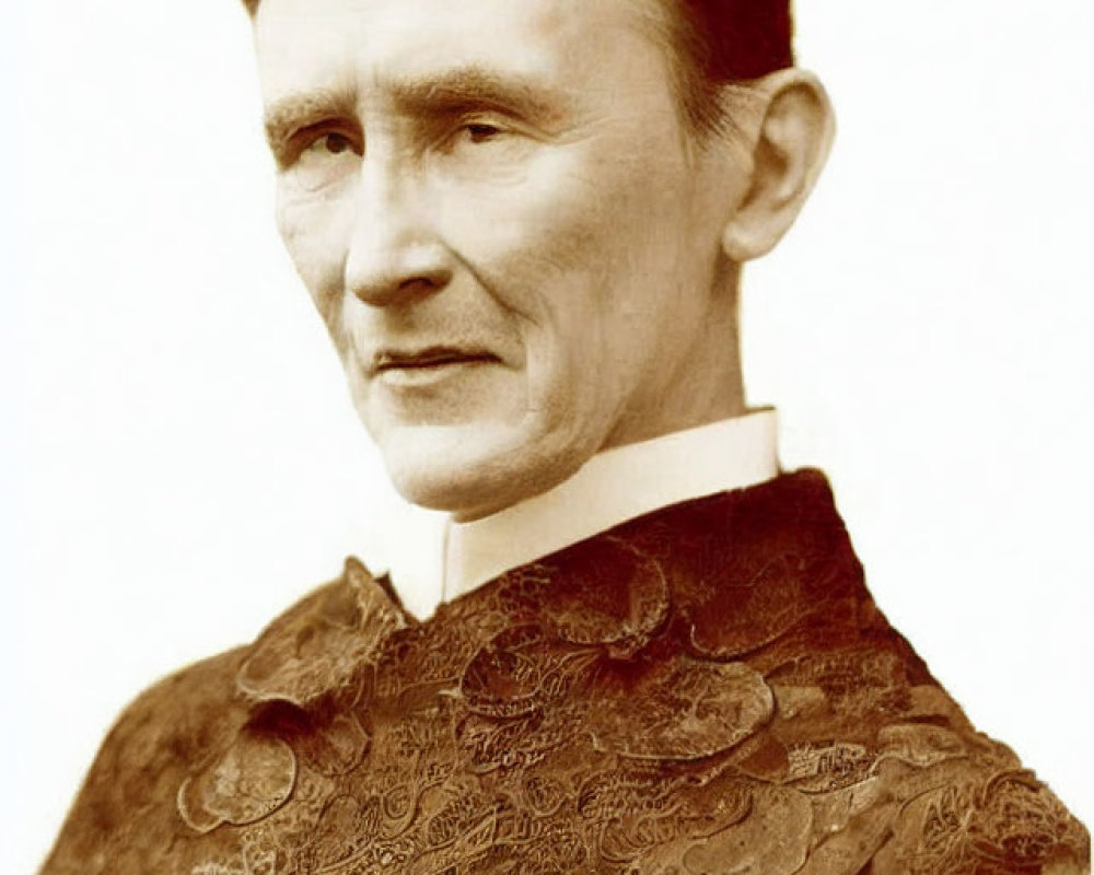 Vintage portrait of a person with center-parted hair in high-collared attire