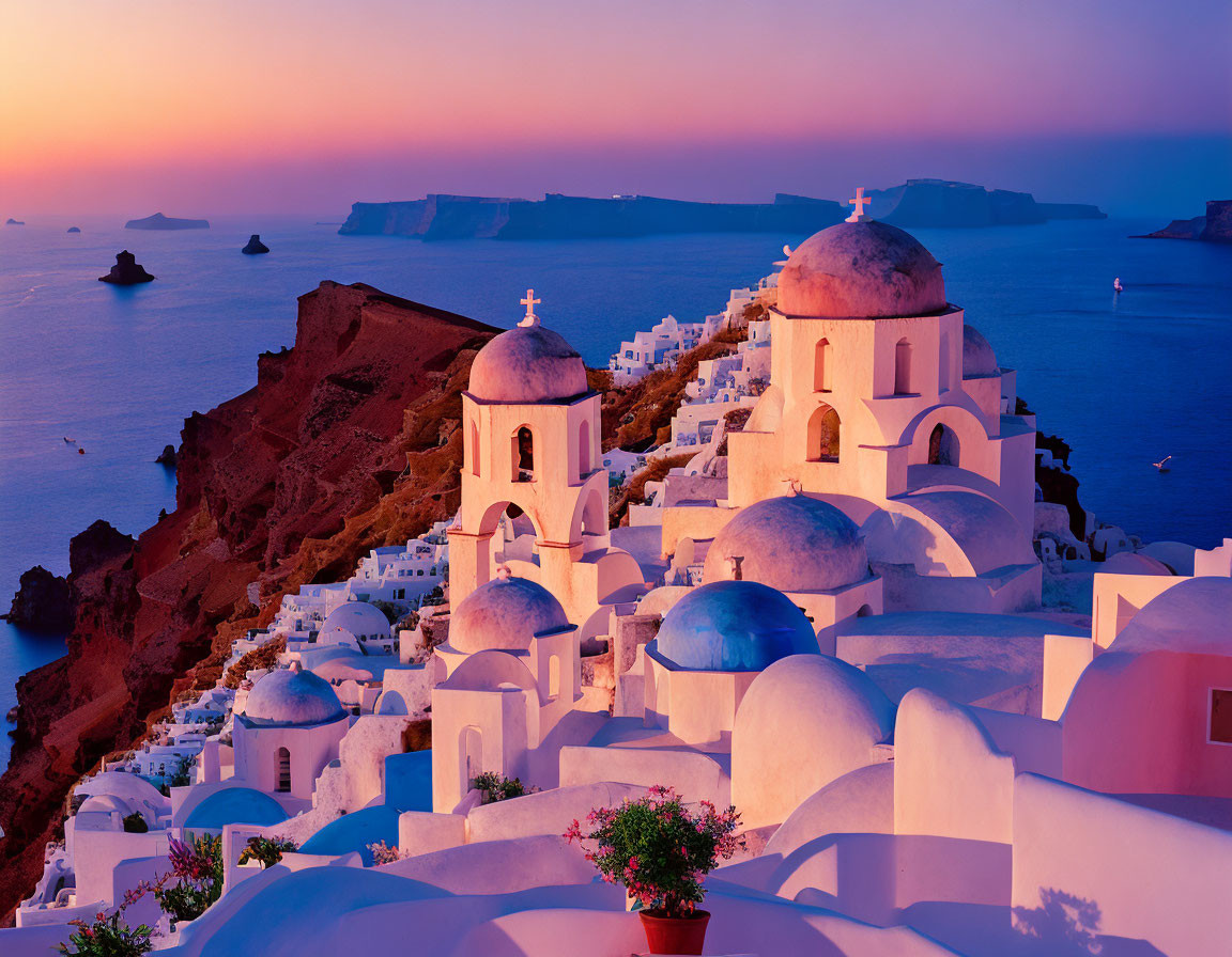 Santorini Sunset: White Buildings & Blue Domes by the Aegean