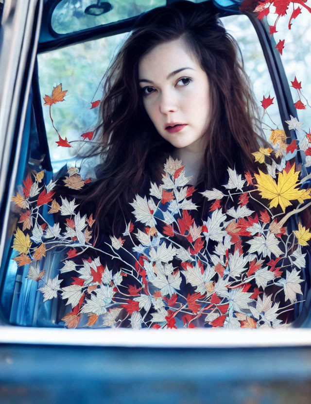 Woman Contemplating Through Car Window with Autumn Leaves