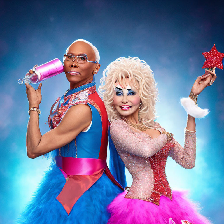 Colorful performers in sparkly costumes with star wand against blue backdrop