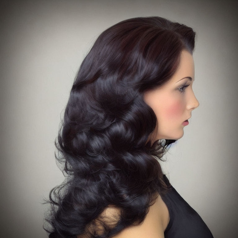 Portrait of Woman with Long, Wavy Dark Hair