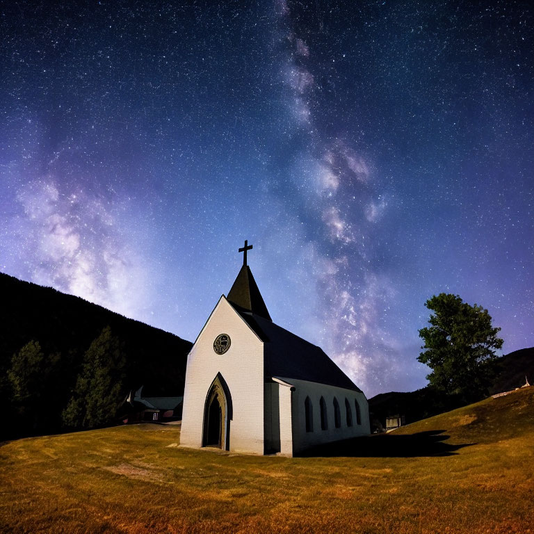 Small Church Under Starry Night Sky with Milky Way Over Dark Hills