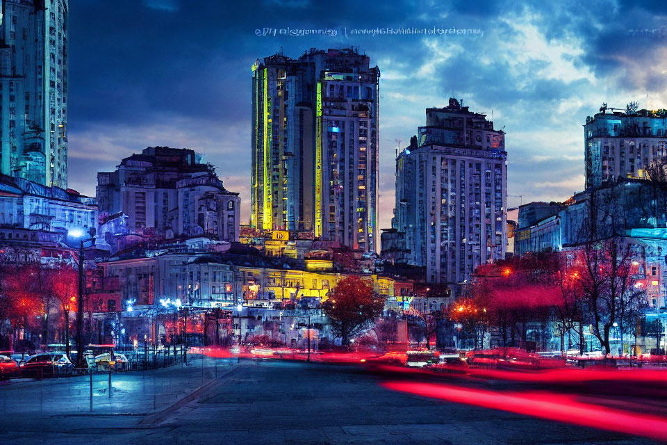 Vibrant twilight cityscape with illuminated buildings and light trails.