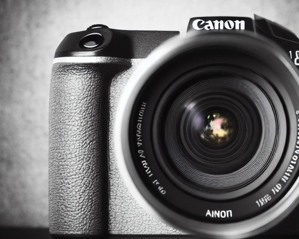 Detailed Close-Up of Canon Camera with Large Lens on Gray Backdrop