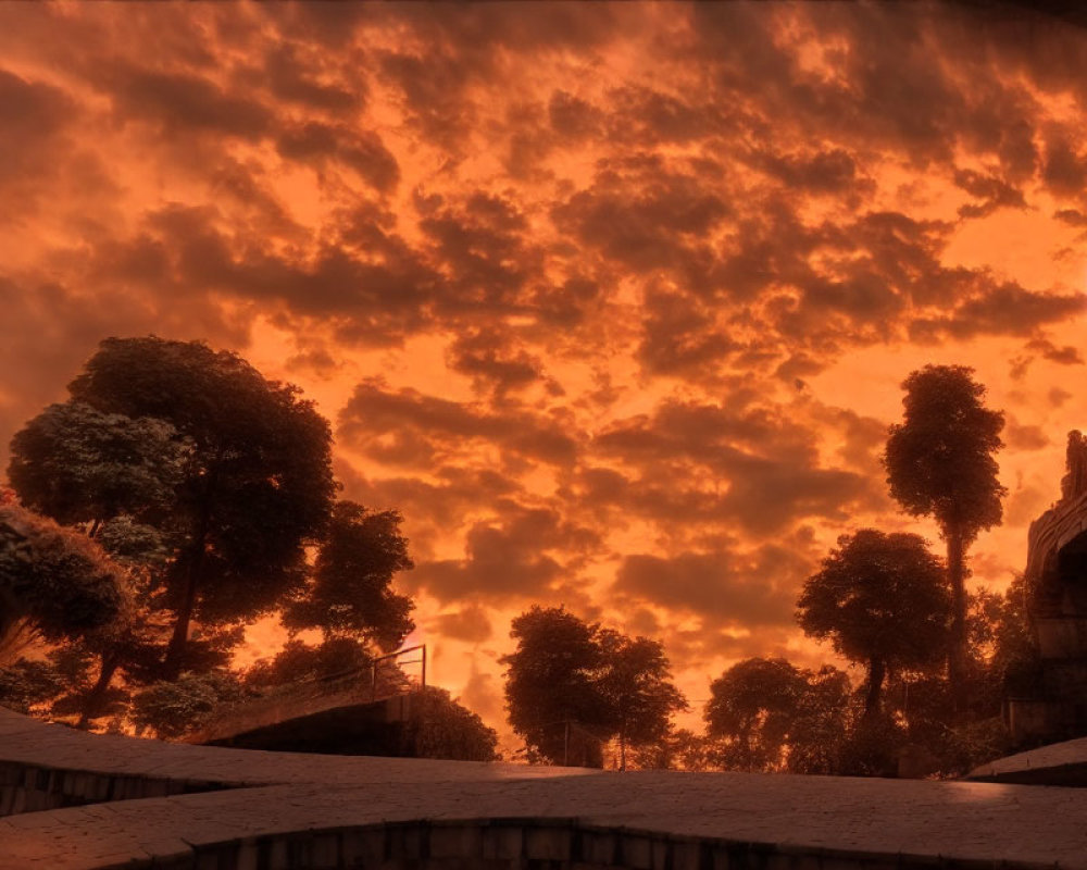 Dramatic red sky over deserted landscape with trees and steps