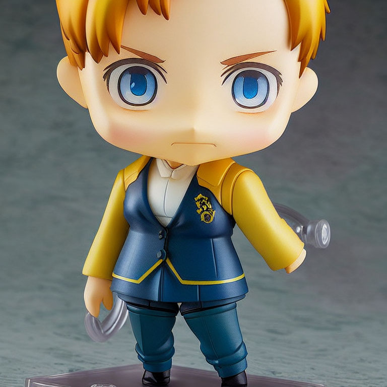 Blonde Boy Figurine in Blue and Yellow Outfit