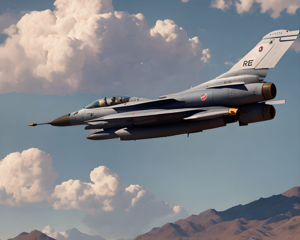 Military fighter jet with "RE" tail code in mid-flight over clouds, mountains, and plain