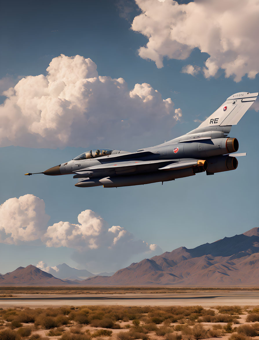 Military fighter jet with "RE" tail code in mid-flight over clouds, mountains, and plain