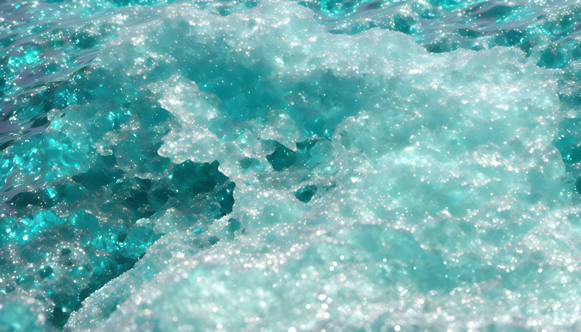 Close-Up of Sparkling Turquoise Sea Foam Bubbles and Froth