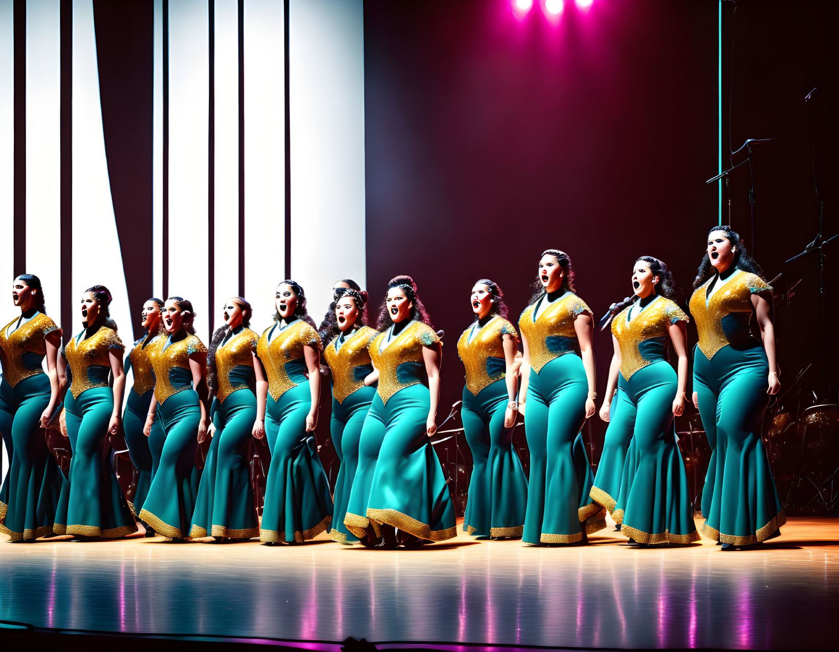 Group of Dancers in Teal Dresses with Yellow Accents on Stage