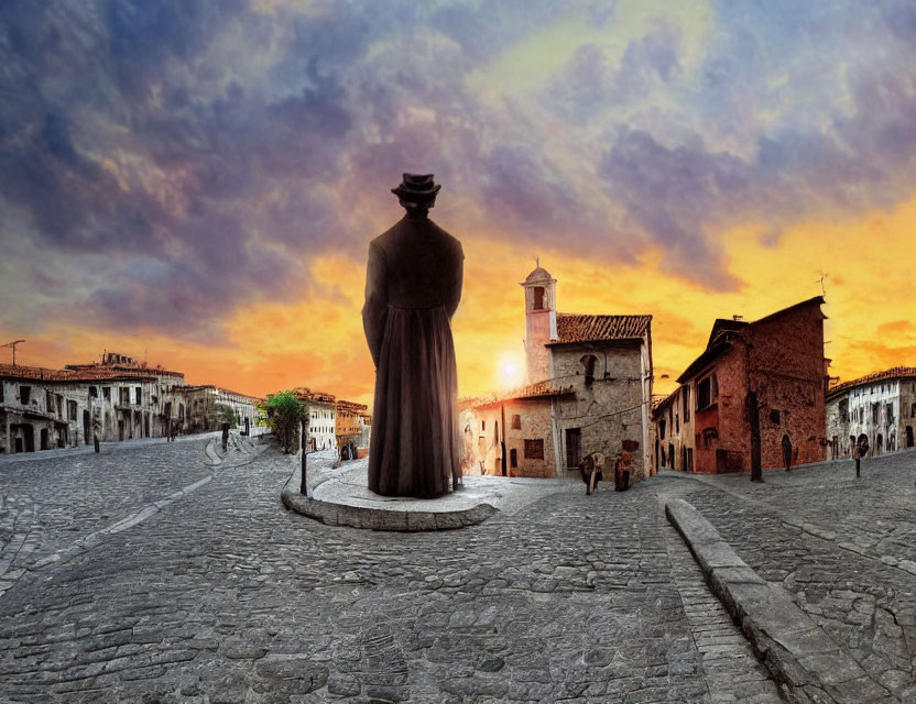 Historical statue in sunset-lit town square with dramatic sky