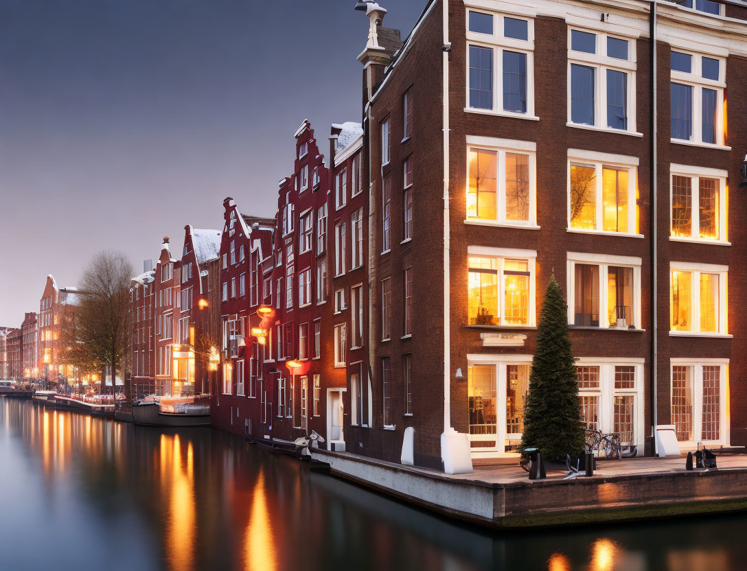 Peaceful Amsterdam Canal with Traditional Dutch Houses at Twilight