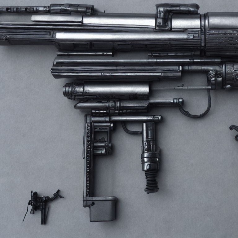 Disassembled Black Rifles Components on Grey Background