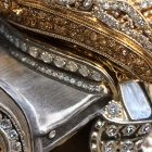 Detailed Jewel-Encrusted Object with Gold Detailing