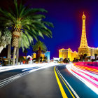 Vibrant Las Vegas night scene with Eiffel Tower replica and traffic lights