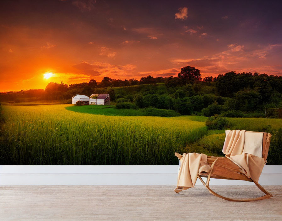 Rustic wooden rocking chair with beige throw in rural sunset landscape