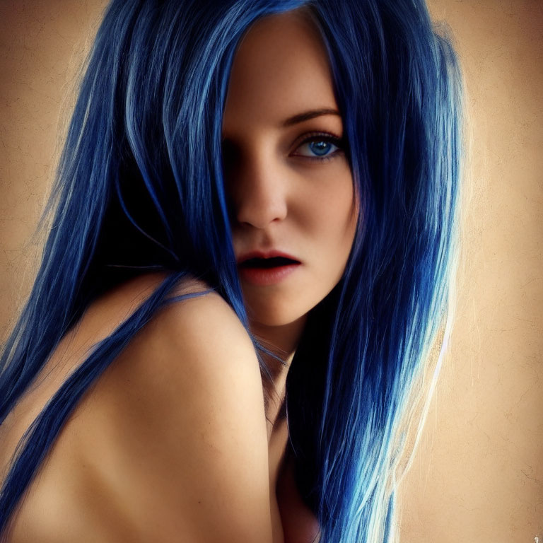 Portrait of person with striking blue hair and captivating eyes.