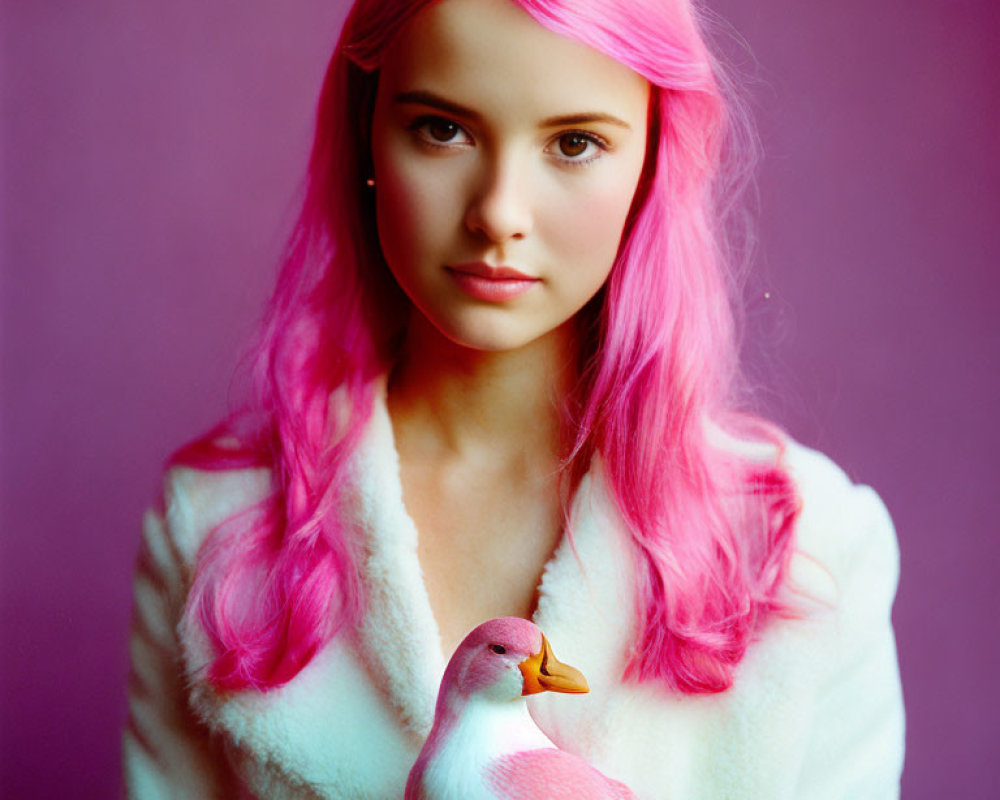 Pink-haired woman in white coat holding pink duckling on purple background