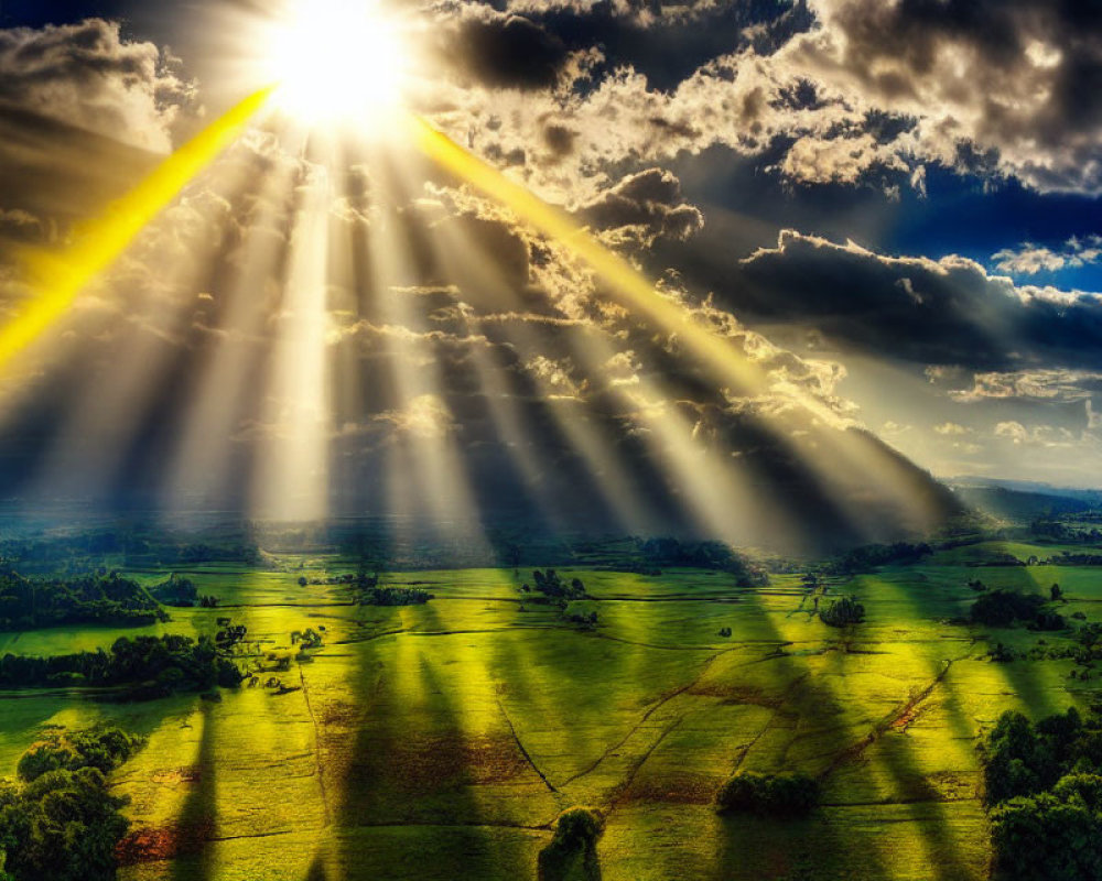 Sunbeams Through Clouds Illuminate Green Landscape