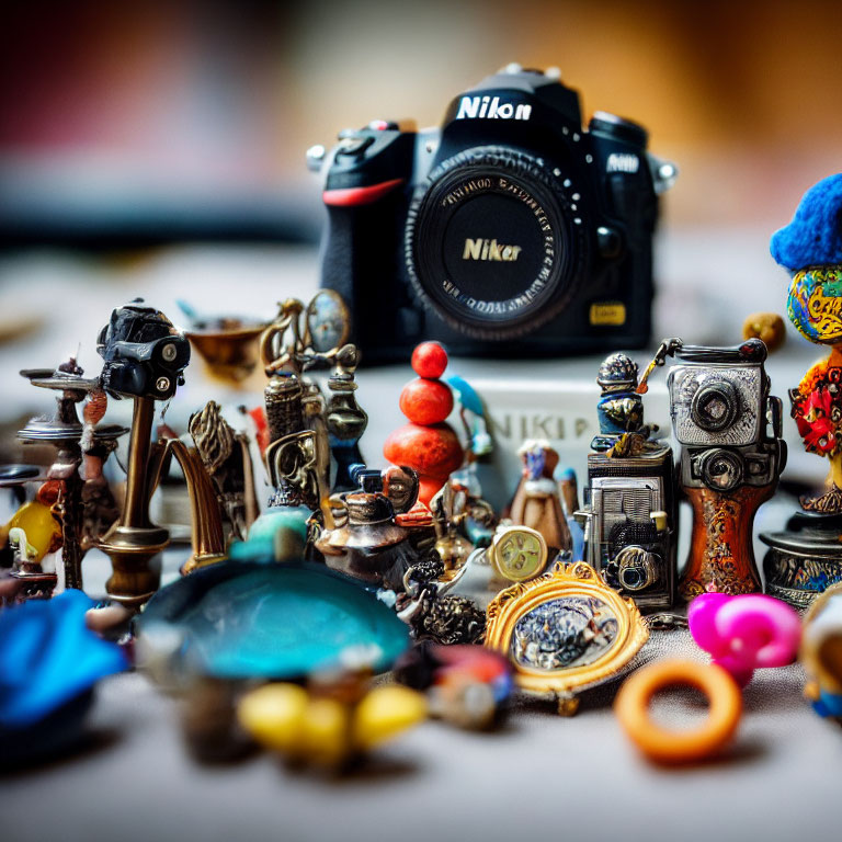 Nikon camera with eclectic trinkets and vintage items