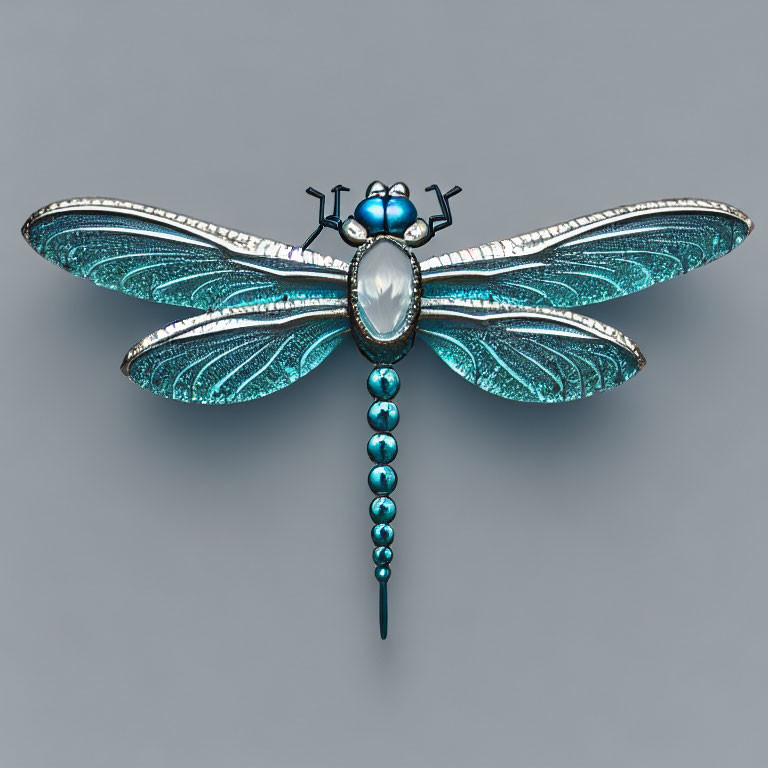 Blue and Silver Dragonfly Brooch with Gemstone Body on Grey Background