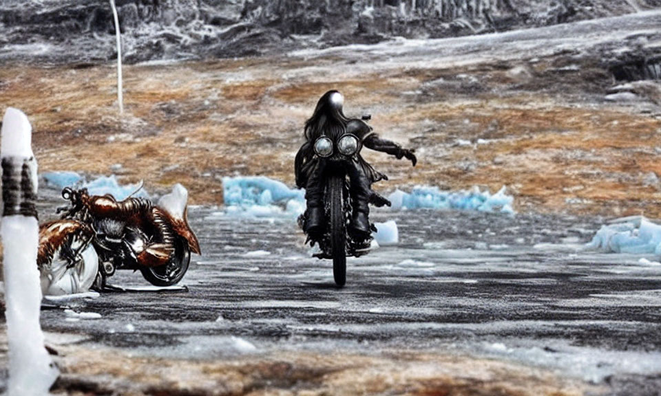 Person in black outfit riding motorcycle on icy road with stationary bike nearby