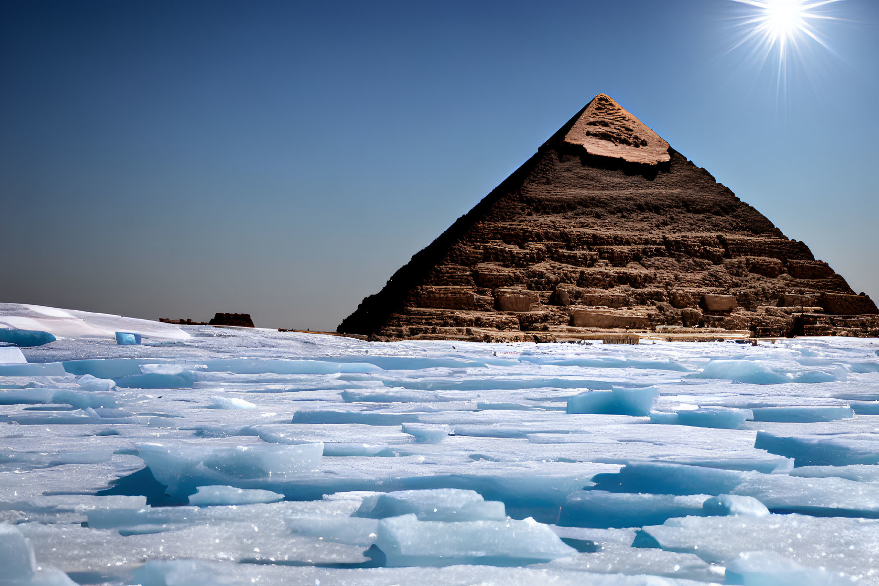 Damaged apex pyramid under bright sun with broken ice sheets