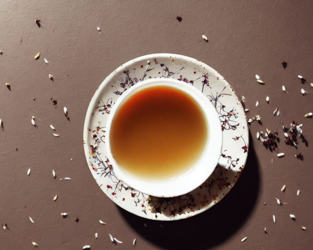 Loose Tea Leaves on Brown Surface: Relaxing and Aromatic Scene