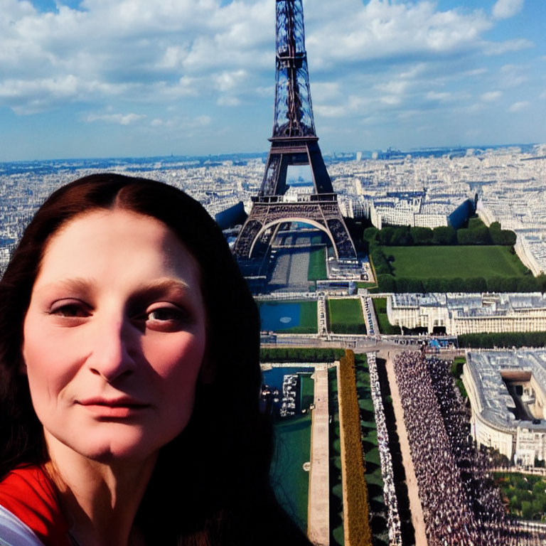 Woman's selfie with Eiffel Tower and Champ de Mars gardens on sunny day