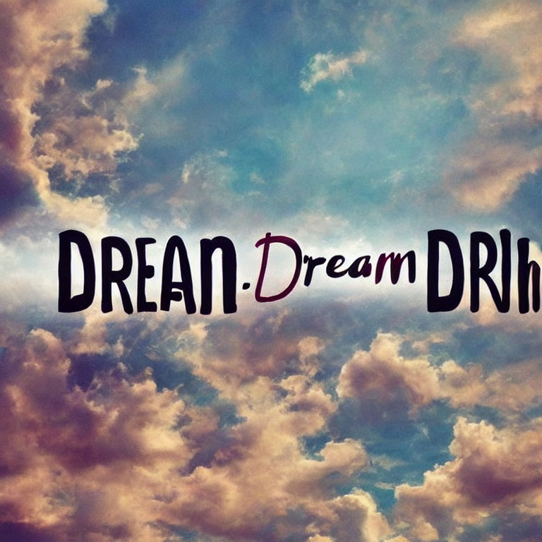 Twilight sky with clouds and "Dream" written in different styles.