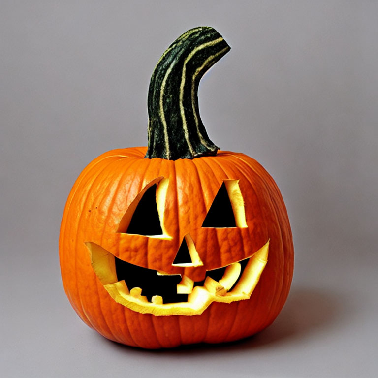 Smiling Jack-o'-lantern Pumpkin on Grey Background