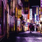 Vibrant Night Market Scene with Lanterns and Stalls