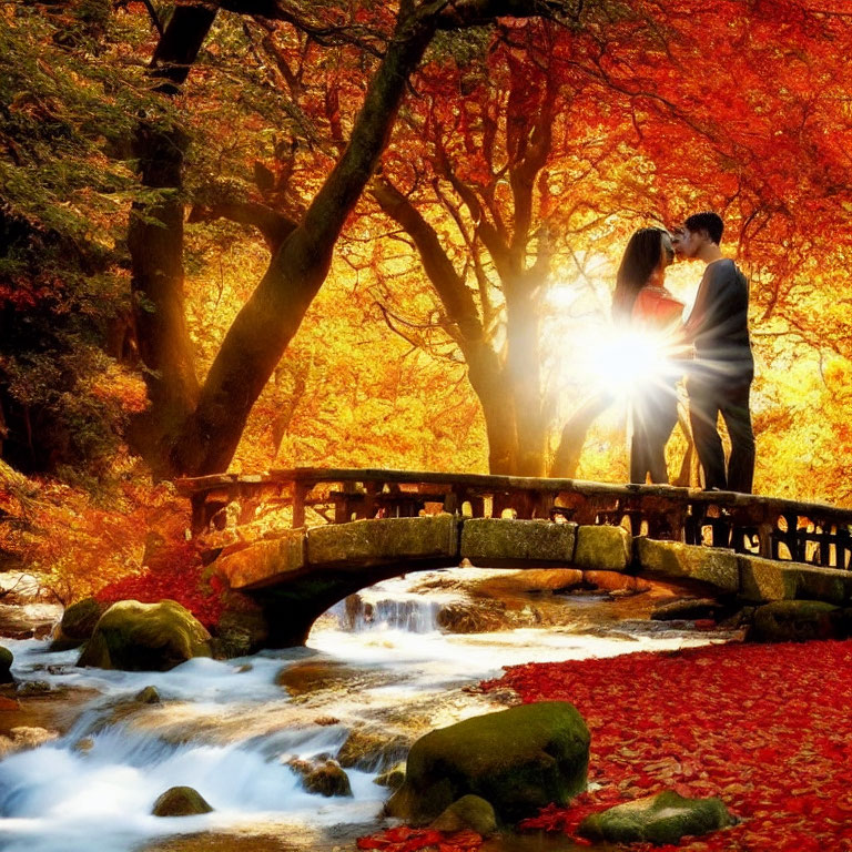 Couple standing on wooden bridge in autumn forest with golden leaves and stream