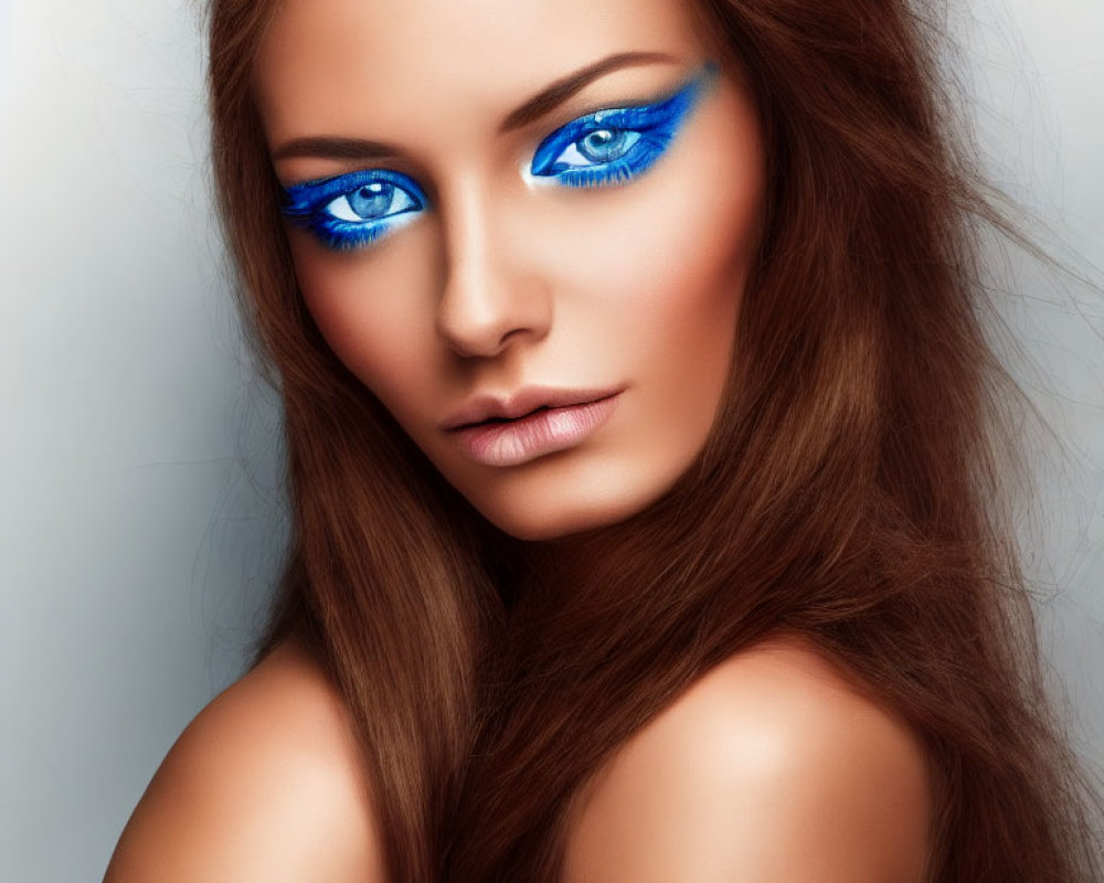 Striking Blue Eye Makeup and Long Brown Hair Portrait