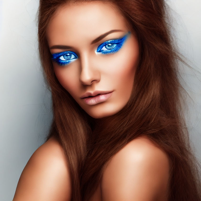 Striking Blue Eye Makeup and Long Brown Hair Portrait