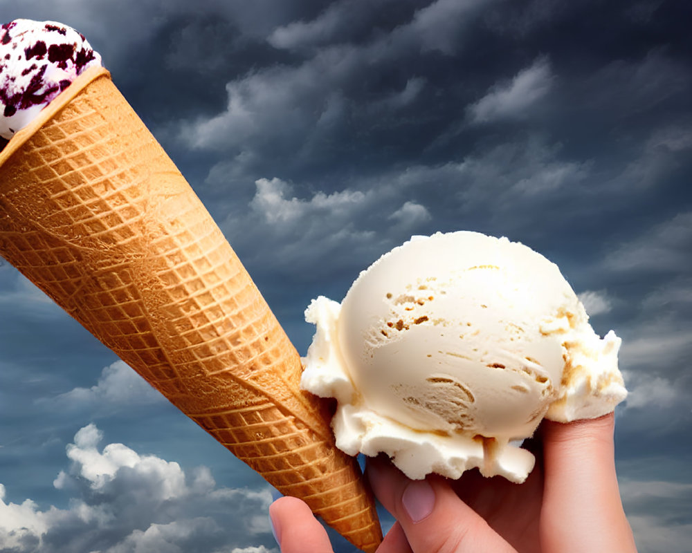 Vanilla ice cream scoop in waffle cone against cloudy sky