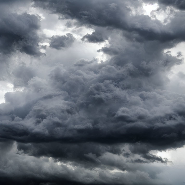 Ominous storm clouds gathering for heavy rain.