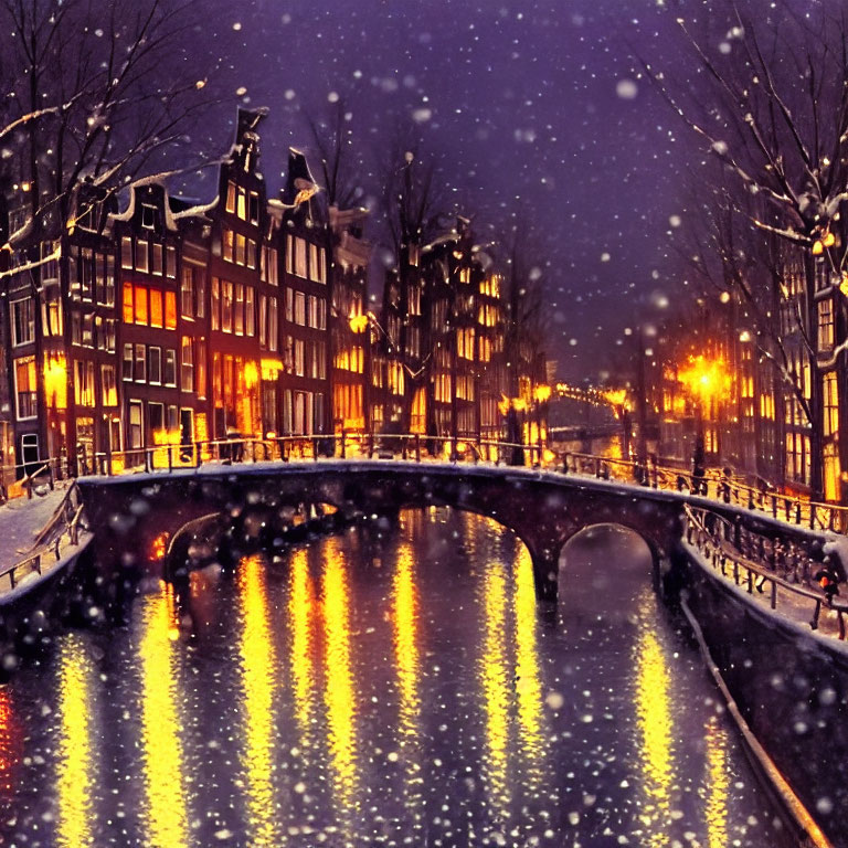 City canal at night with illuminated windows, falling snow, and bare trees reflected in water.