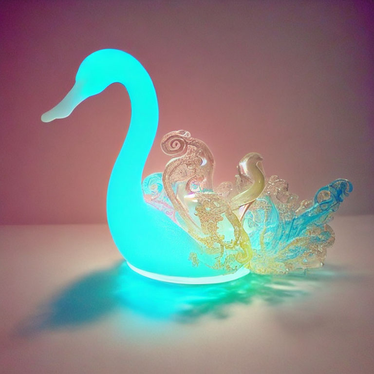 Translucent blue swan figurine with glowing wings on pink background