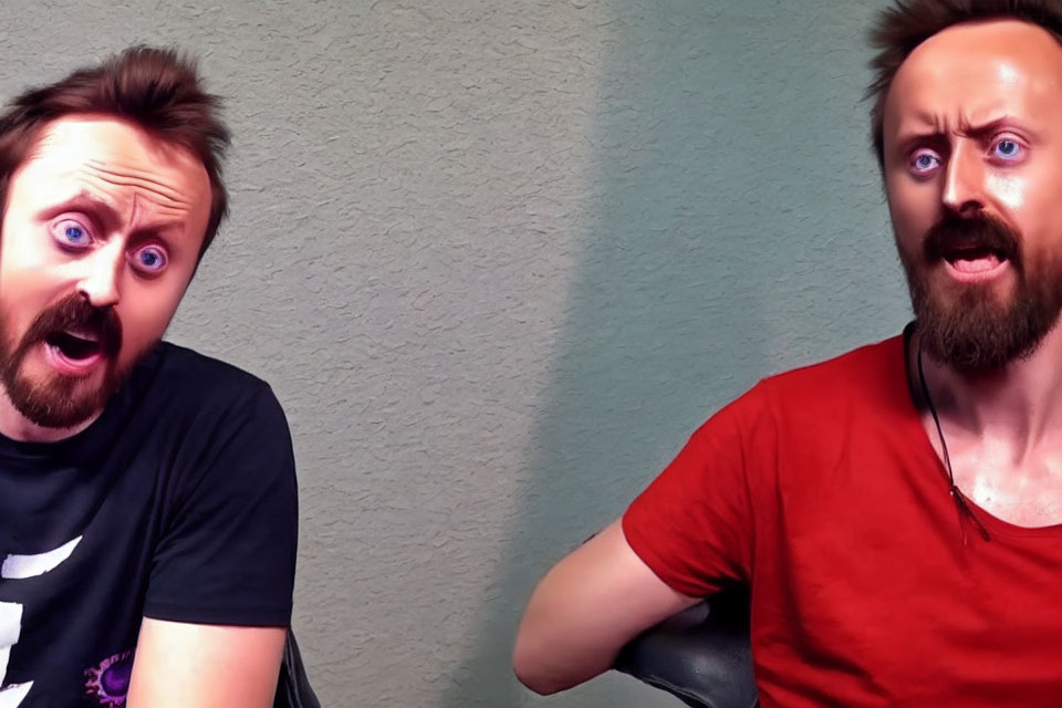 Two men with exaggerated surprised expressions in black and red t-shirts