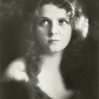 Classic Hollywood Glamour: Vintage Black and White Portrait of Woman with Wavy Hair and Dramatic Makeup