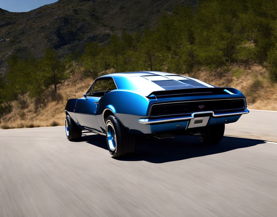 Blue Classic Muscle Car Driving on Mountainous Road