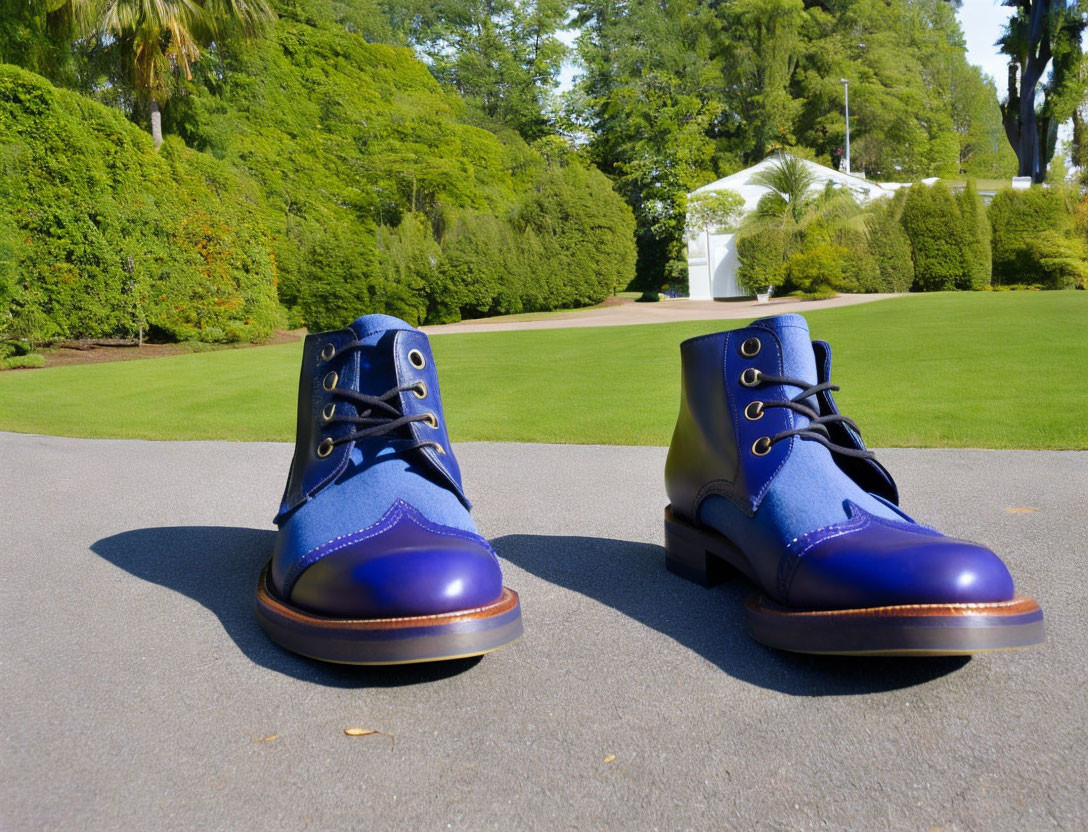 Blue Leather Boots on Pathway in Green Garden