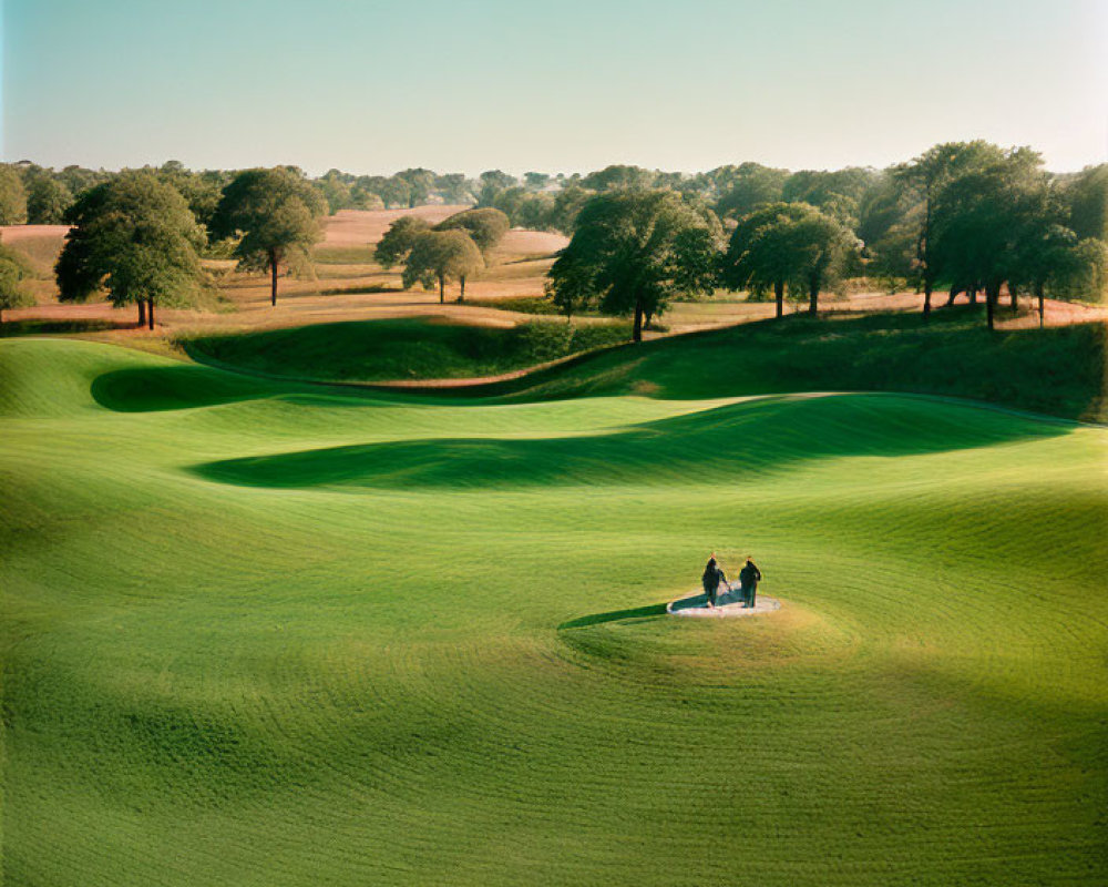 Scenic golf course with undulating fairways and sand bunker