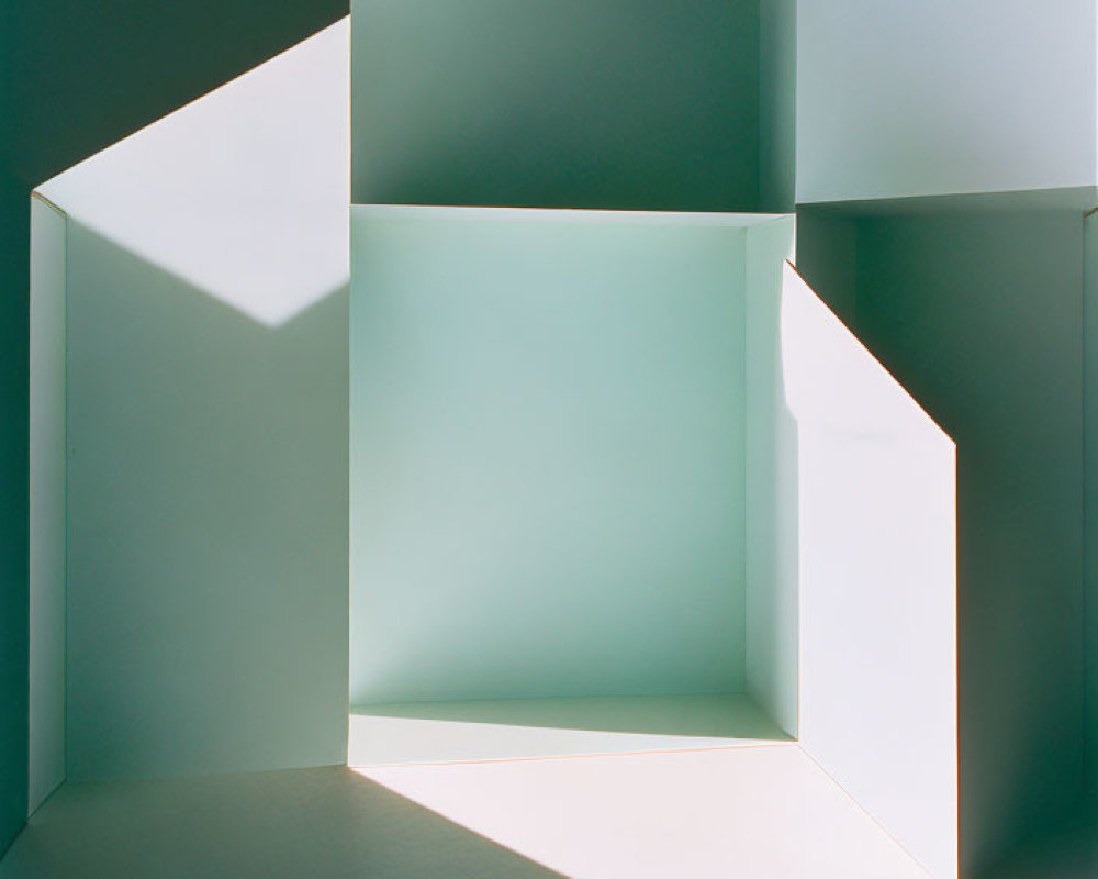 Geometric shapes casting shadows in bright architectural model.