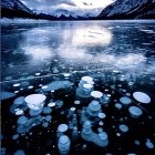 Frozen Lake Surface: Twilight Snowy Mountain Landscape