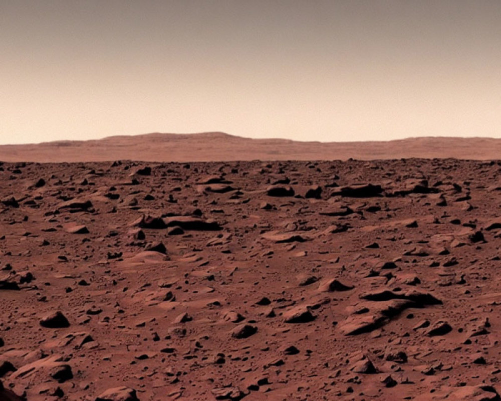 Barren Mars landscape with rocky surface and hazy sky