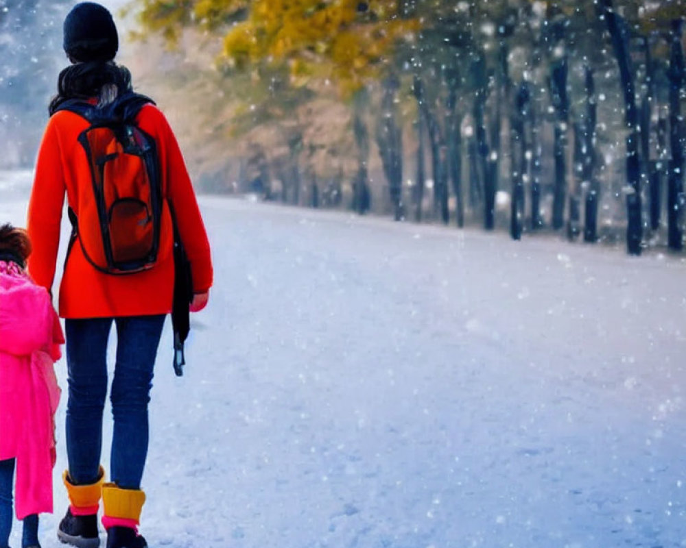 Adult and child walking in snow among winter trees